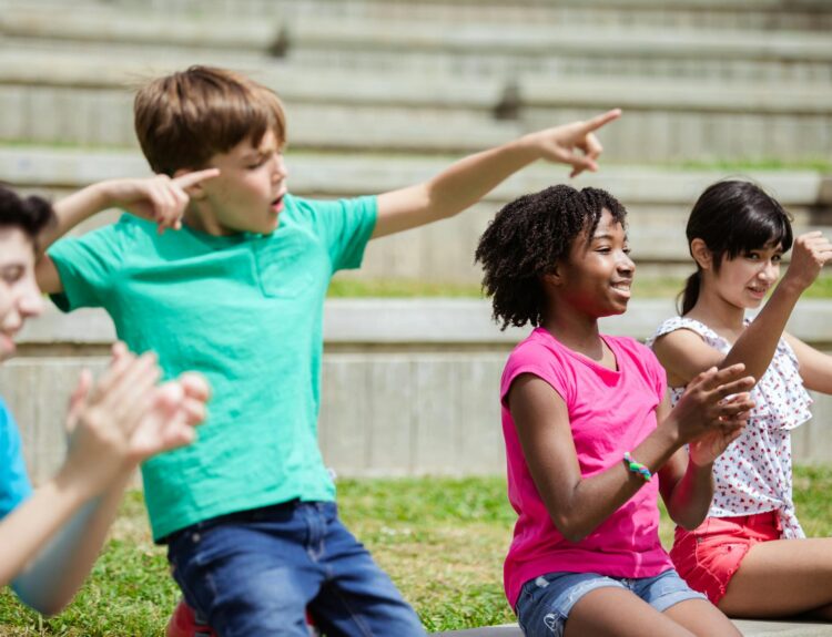 Kids complete exercises outside